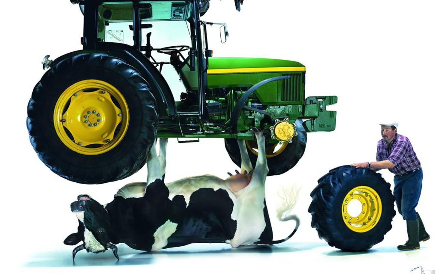 Tractor and cow advertisement
