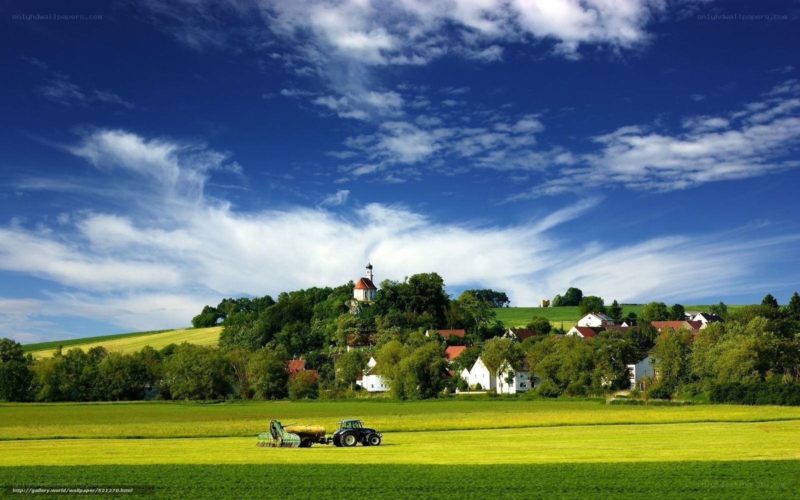 Tractor in a green field
