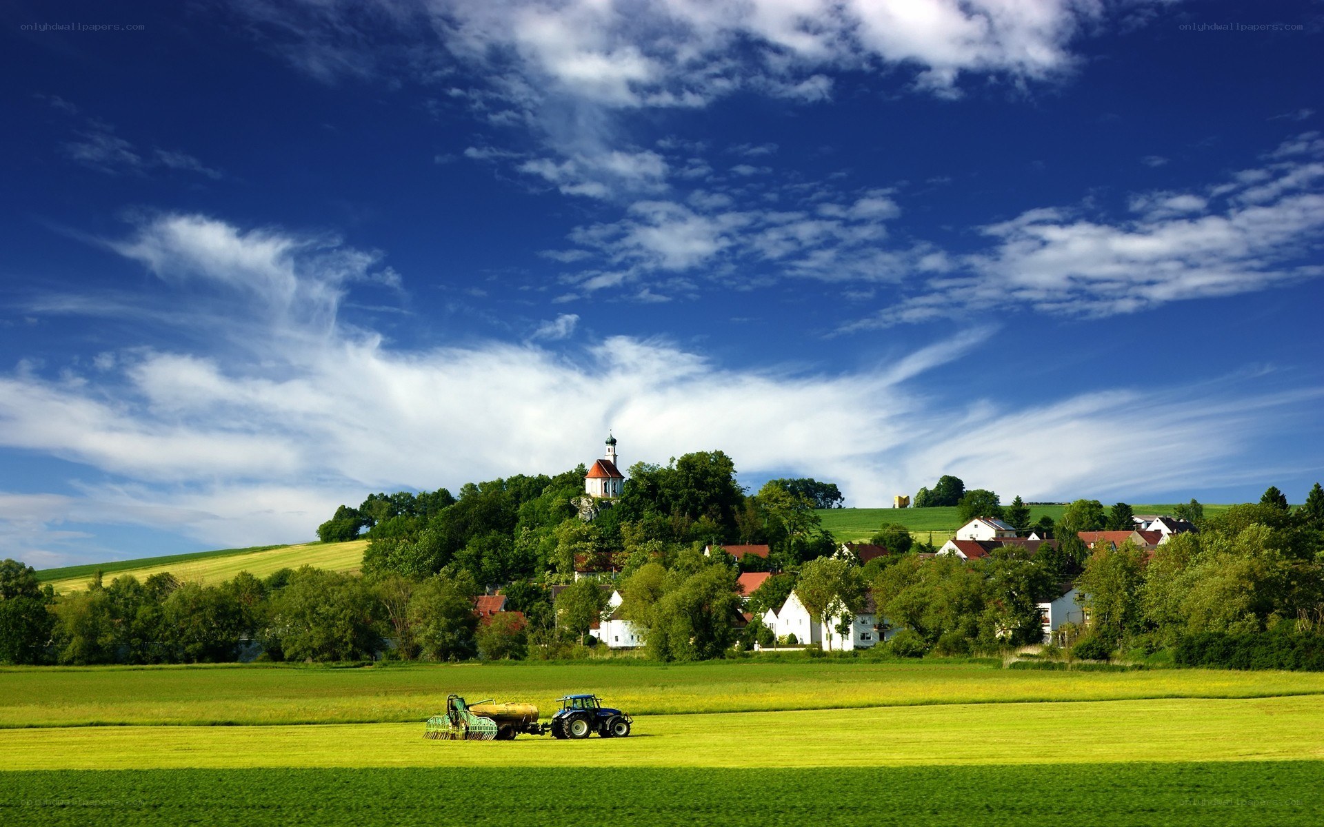 Tractor in a green field