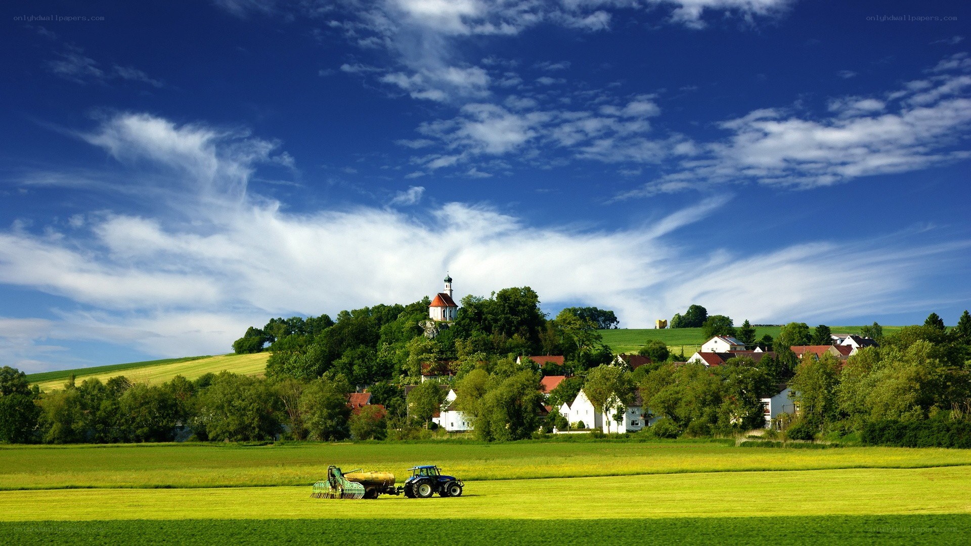 Tractor in a green field