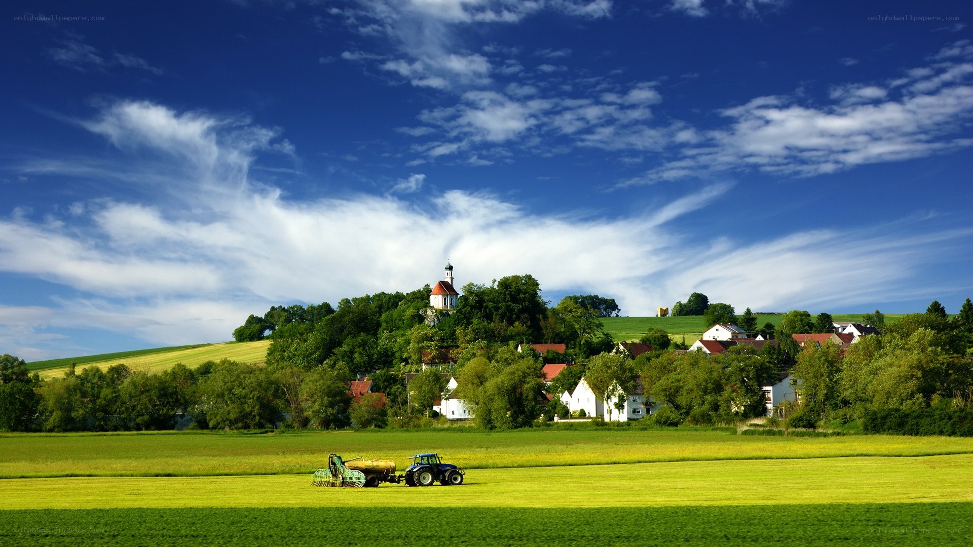 Tractor in a green field