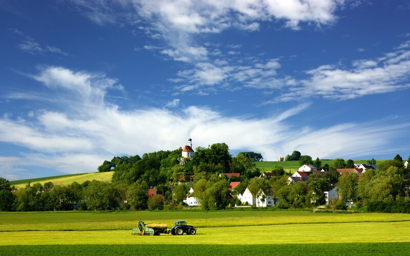 Tractor in a green field