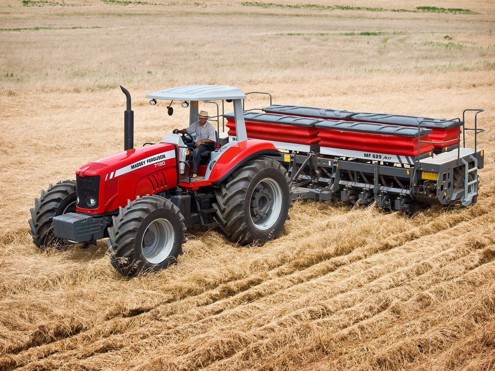 Tractor in a harvested field