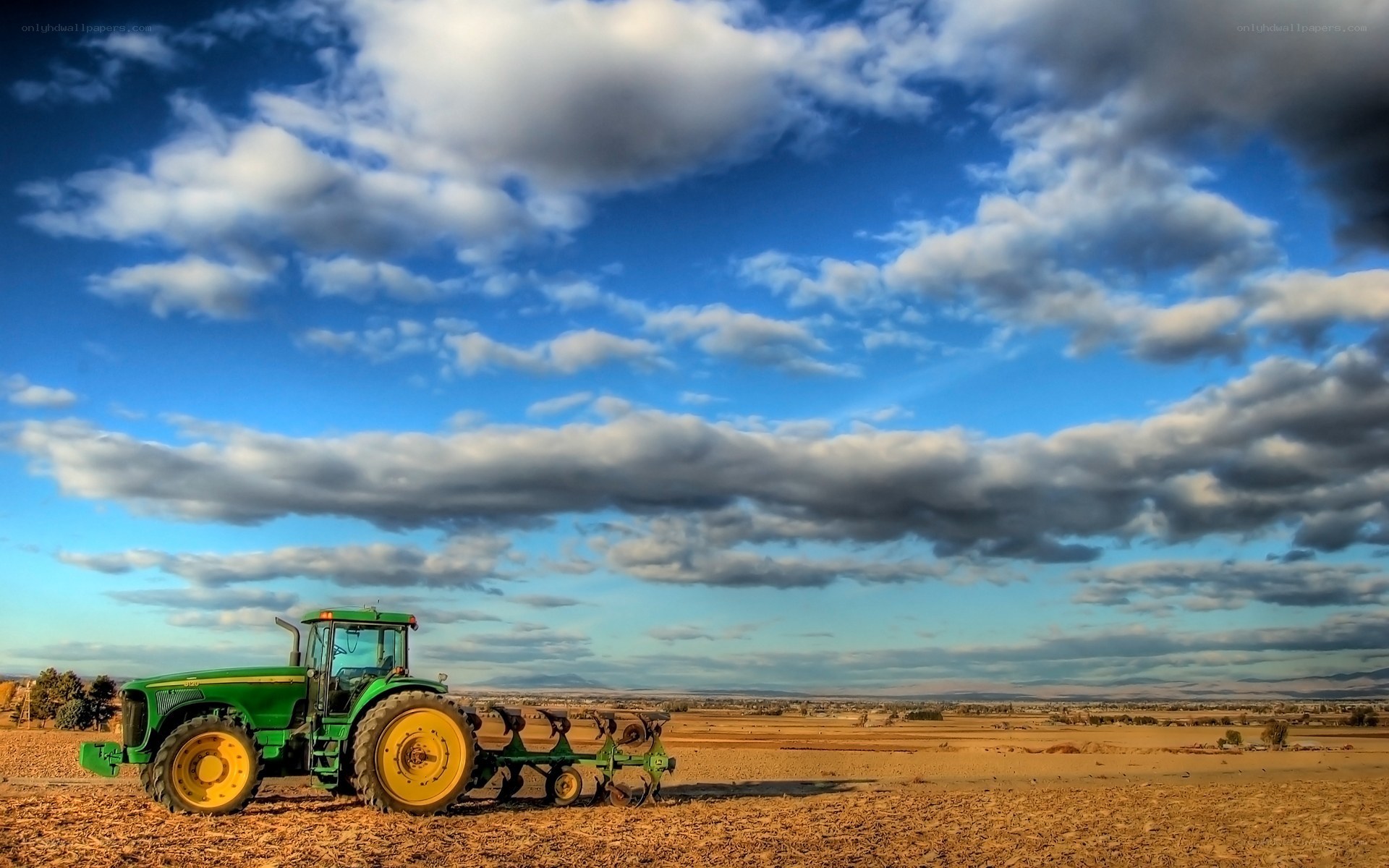 Tractor in a plowed field