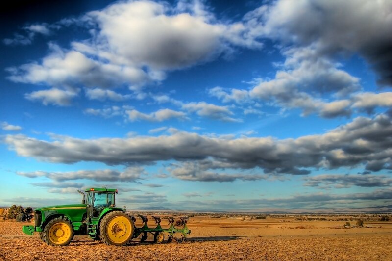 Tractor in a vast field