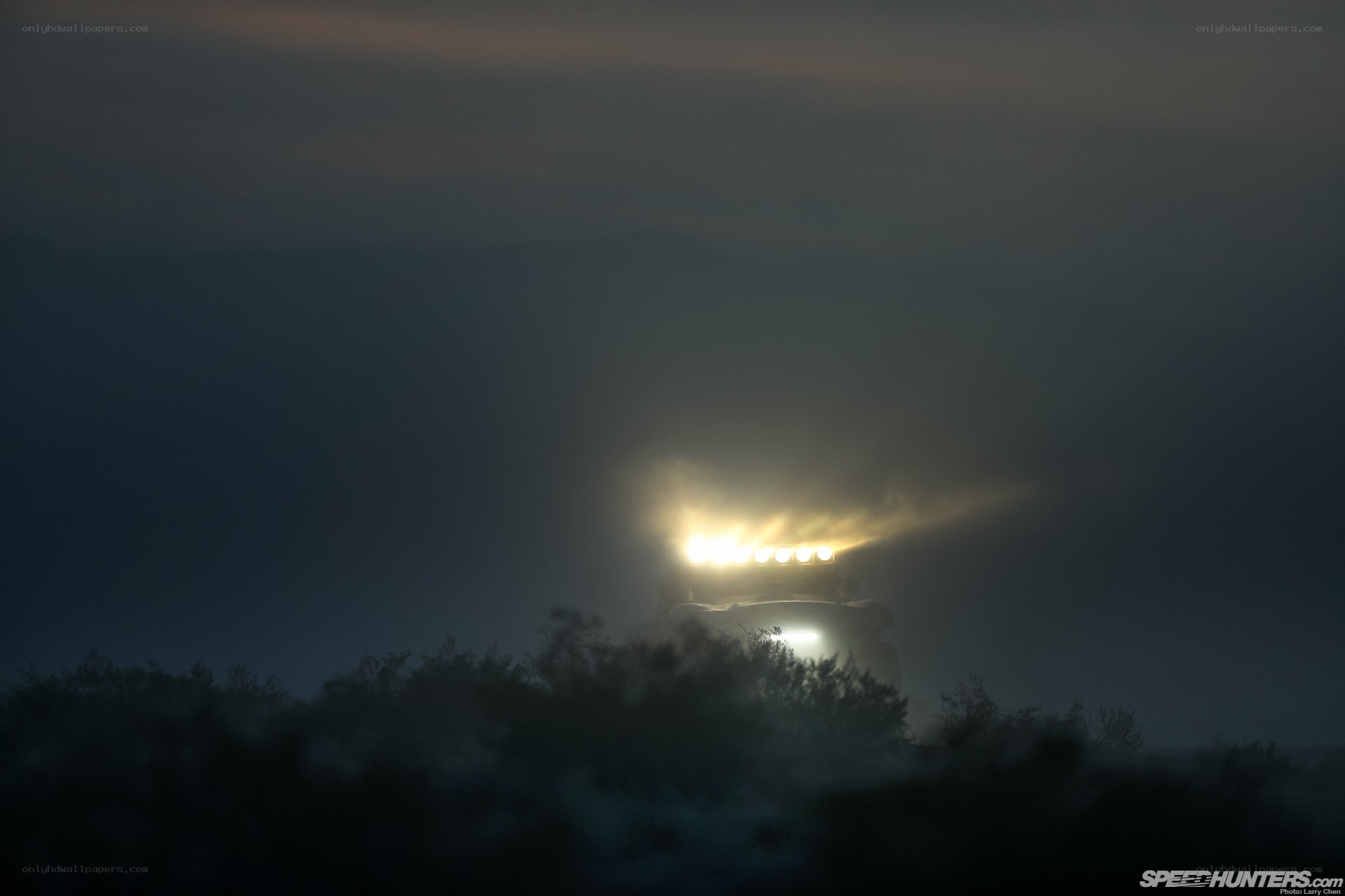 Tractor in fog at night