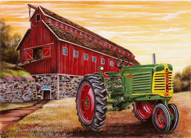 Tractor in front of red barn