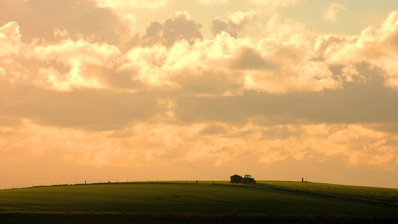 Tractor on a Hill — Orange, Dramatic, Sunset, Photograph, Clouds