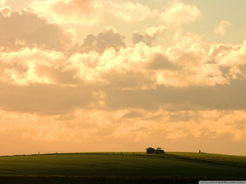 Tractor on a Hill — Orange, Serene, Sunset