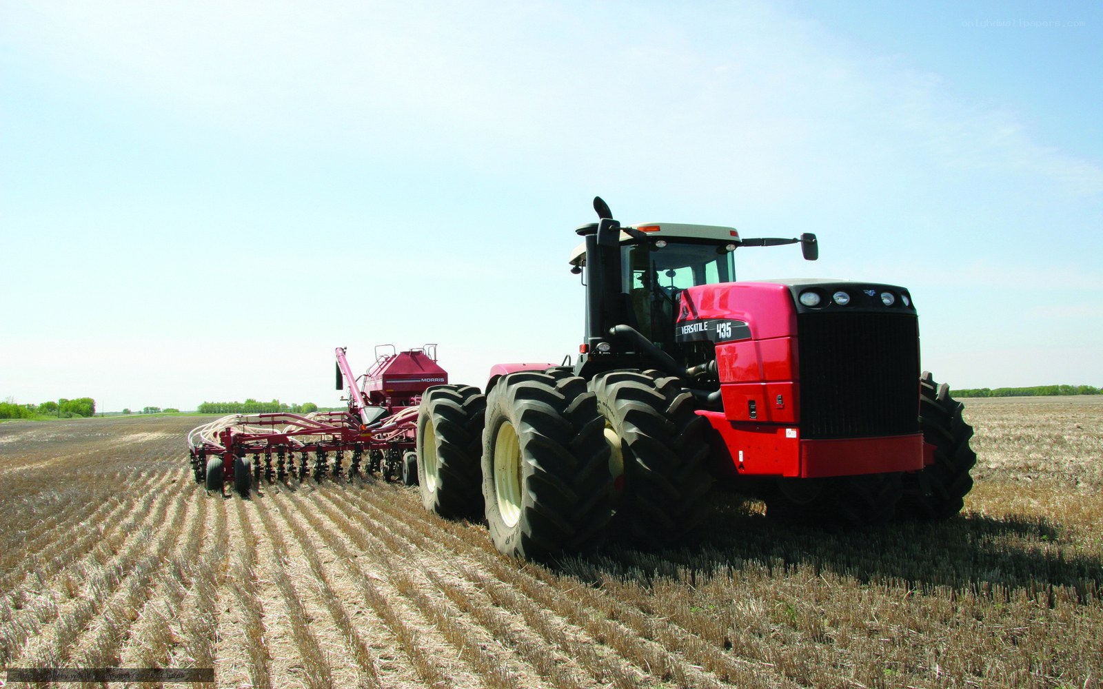 tractor plowing a field