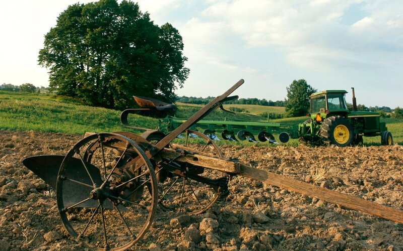 Tractor plowing a field