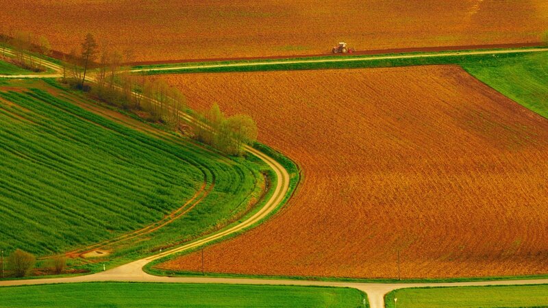 Tractor Plowing Field — Green, Serene