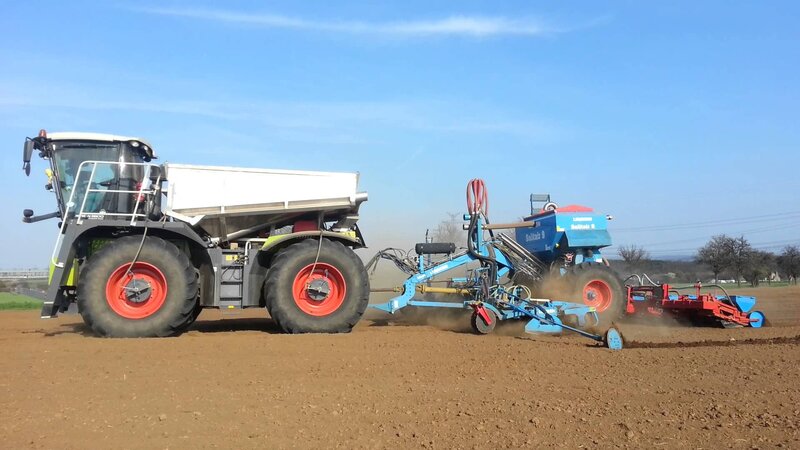 Tractor Pulling Seeder — Brown