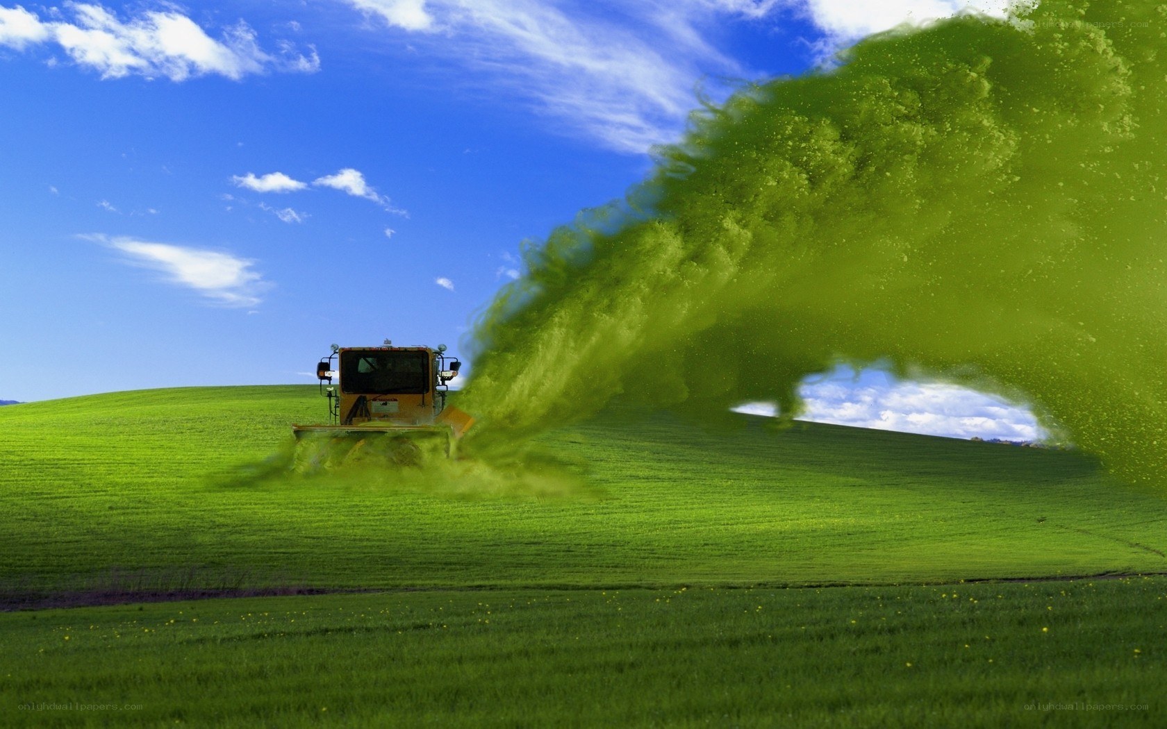 tractor spraying field
