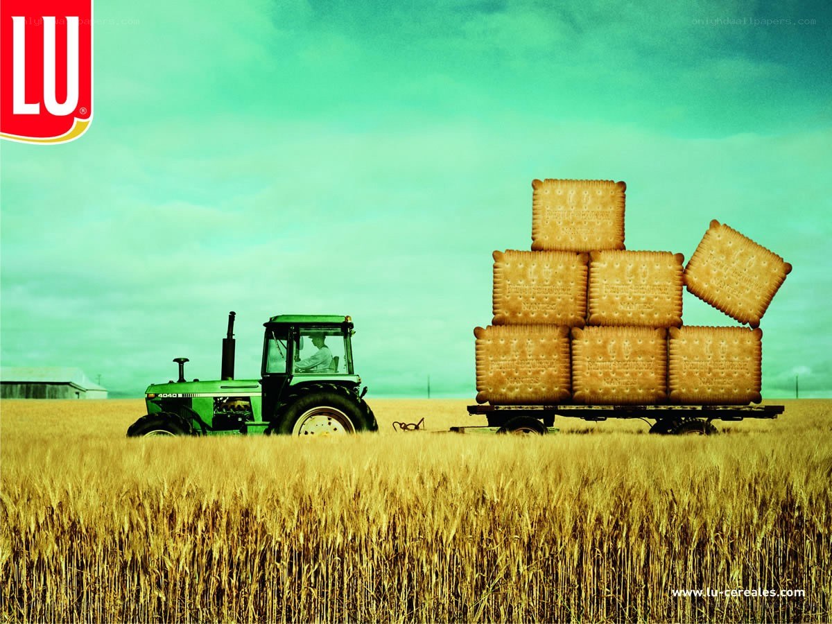 Tractor with giant crackers in field