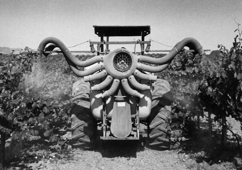 Tractor with octopus-like sprayer