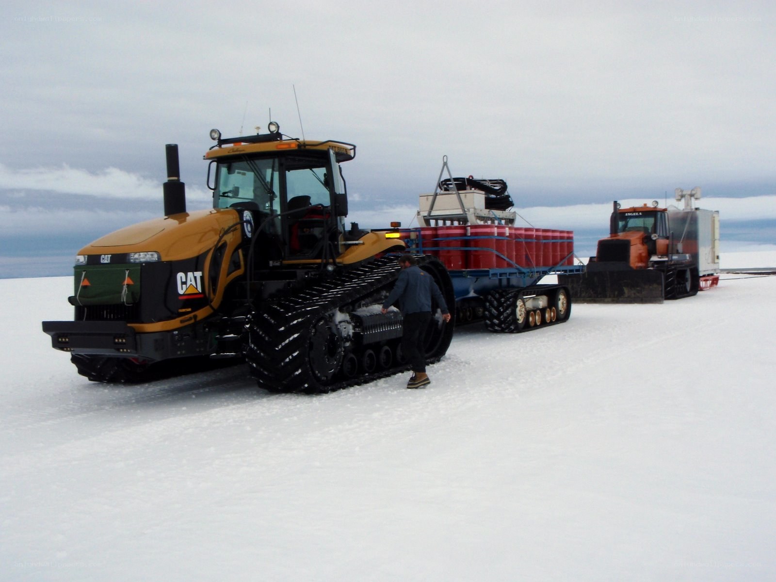 Tractors on snowy terrain