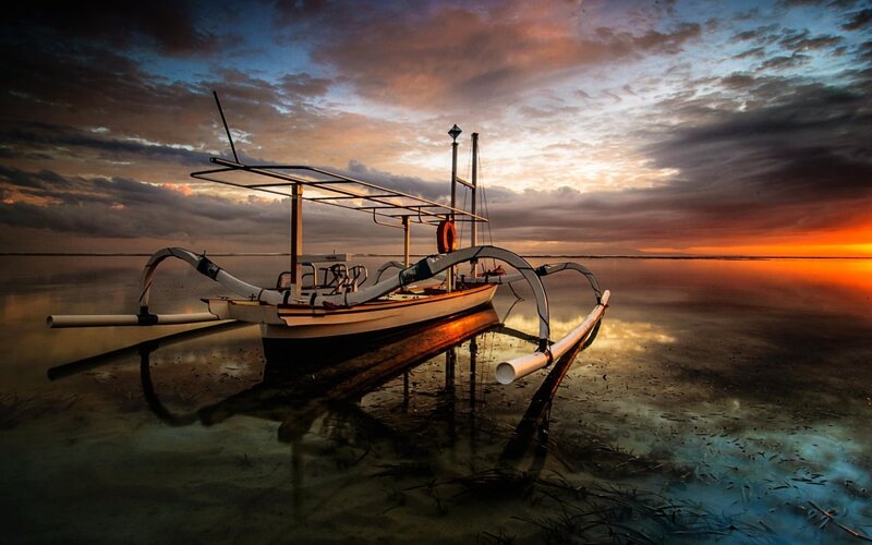 Traditional Boat at Sunset — Orange, Dramatic, Photograph
