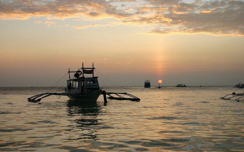 Traditional Boat at Sunset