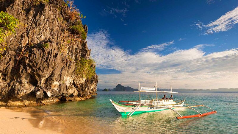 Traditional Boat in Bay — Blue, Serene