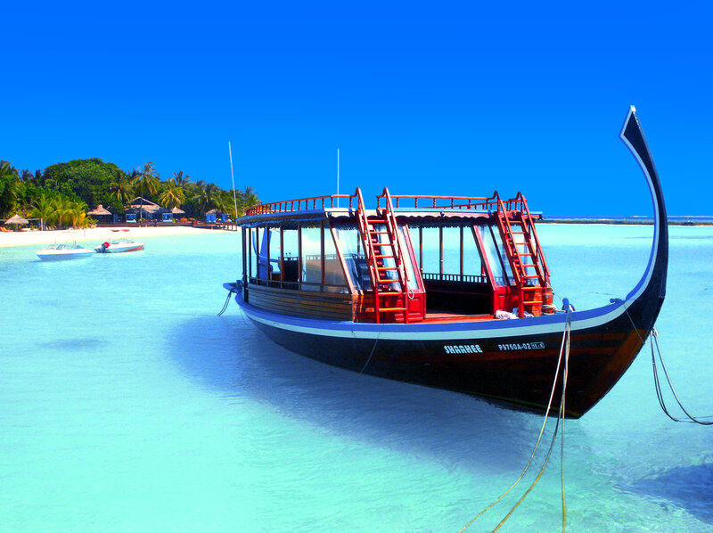 Traditional Boat in Turquoise Water