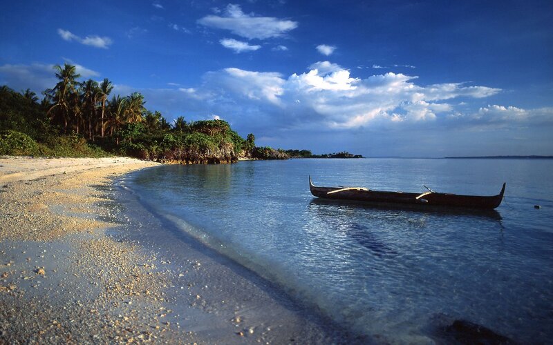 Traditional Boat on Beach — Blue, Serene