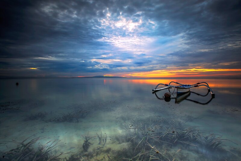Traditional Boat on Shore — Blue