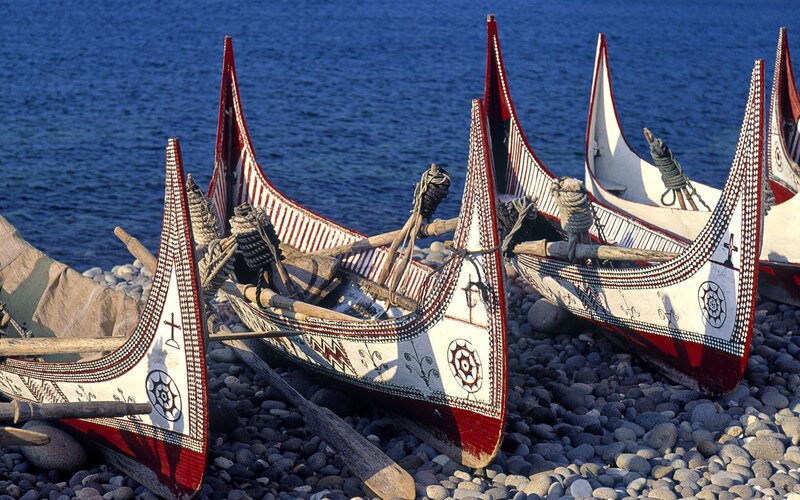 Traditional boats on a pebble beach
