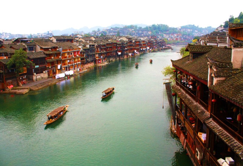 Traditional Boats on River — Green