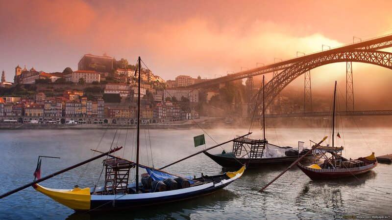 Traditional Boats on River — Orange, Serene