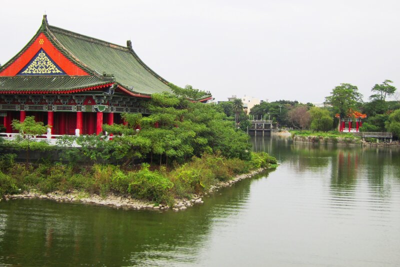 Traditional Building by Lake — Green