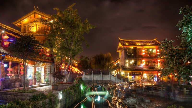 Traditional Buildings at Night — Yellow