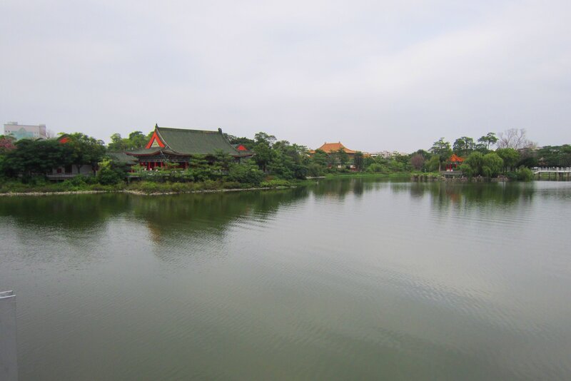 Traditional Buildings by Lake — Green