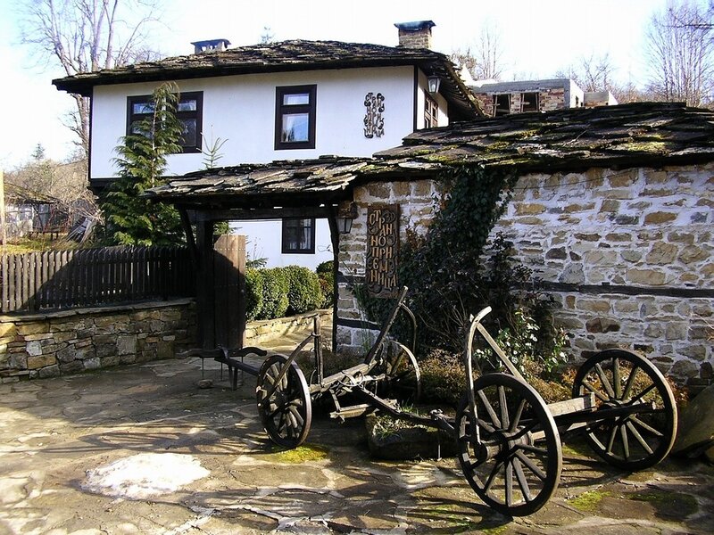 Traditional Bulgarian house with cart