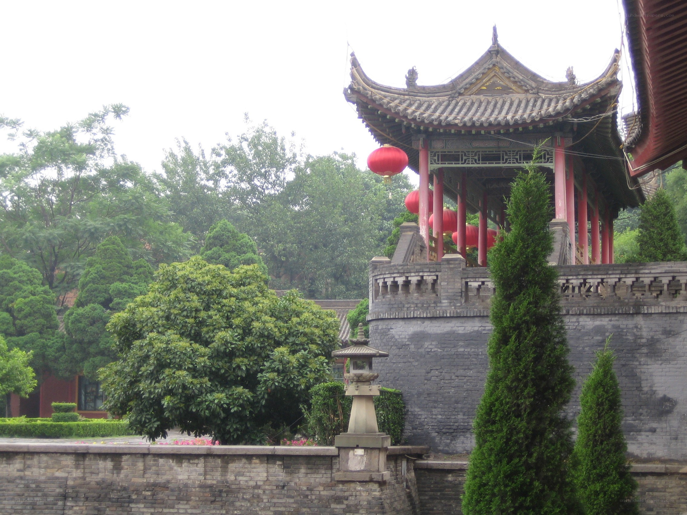 traditional chinese pavilion with red lanterns