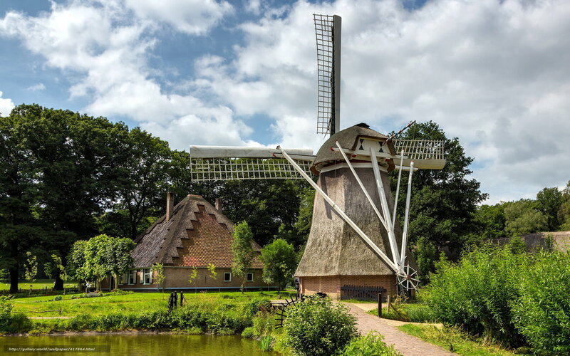 Traditional Dutch windmill and house