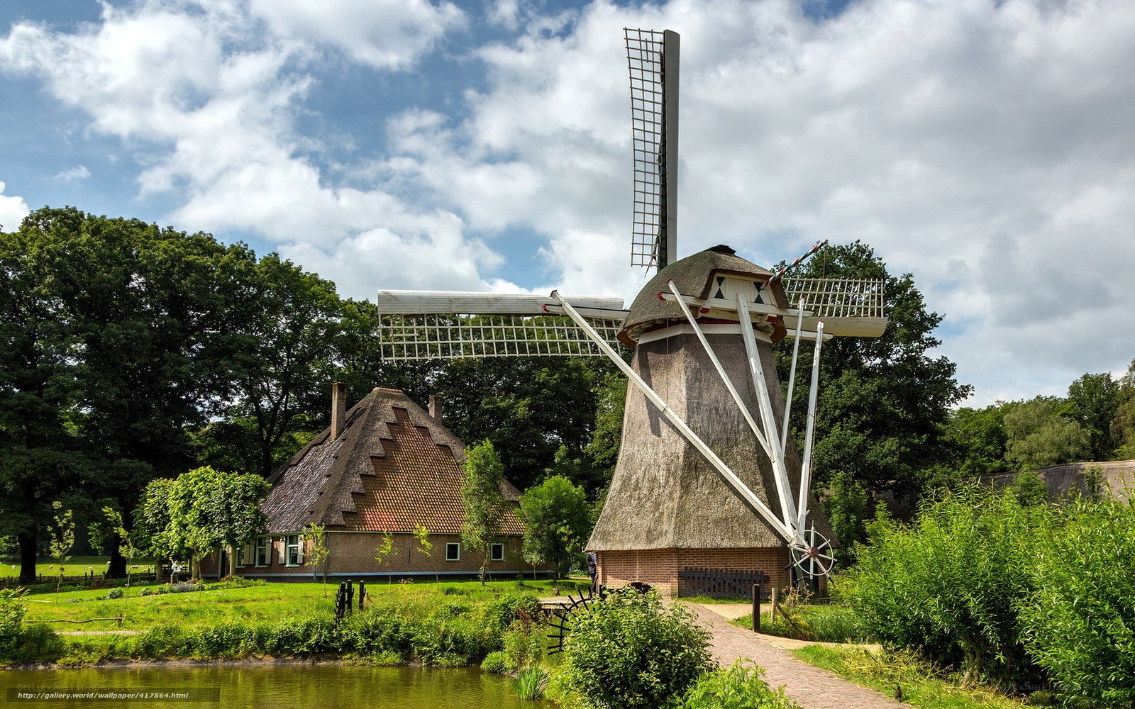 Traditional Dutch windmill and house