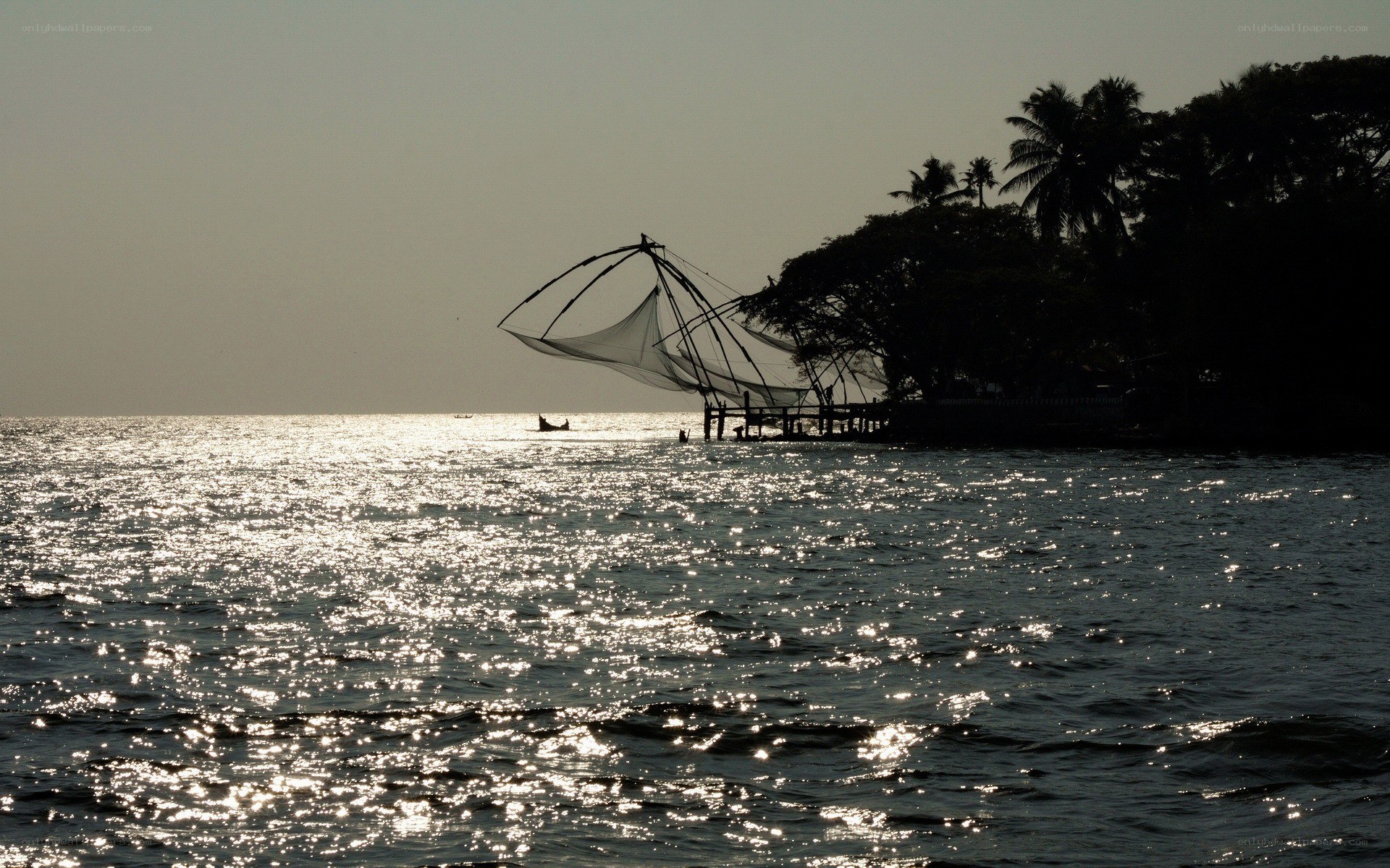 Traditional fishing nets at sunset