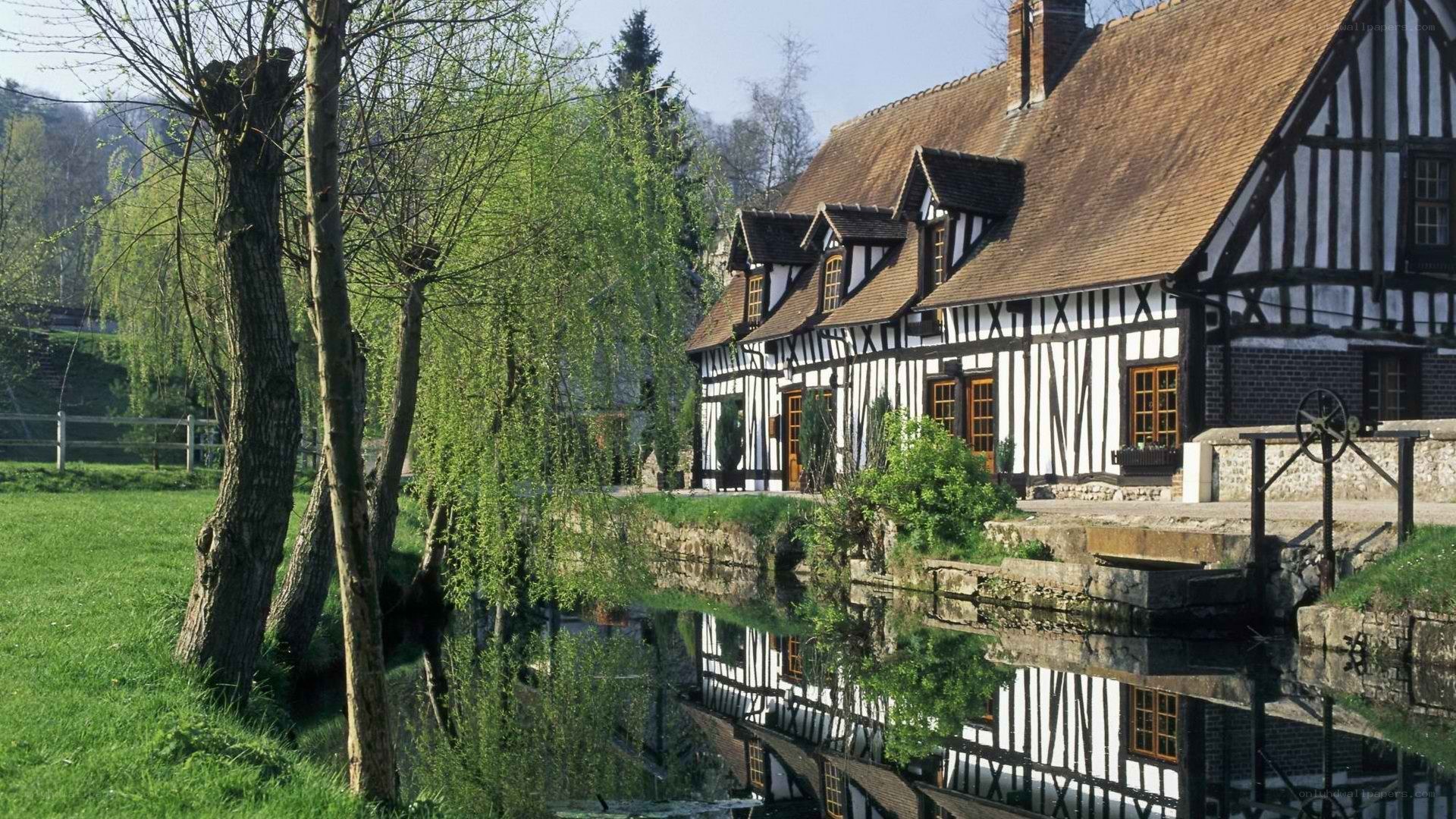 Traditional half-timbered house by a river