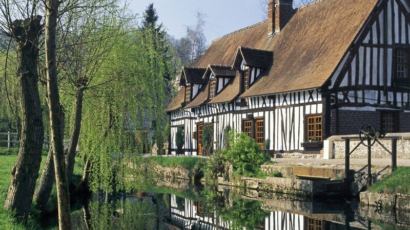 Traditional half-timbered houses by a river