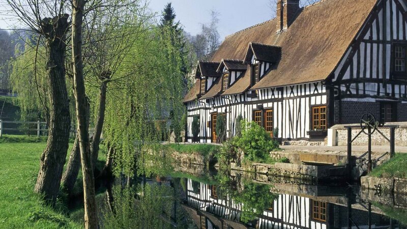 Traditional half-timbered houses by a river