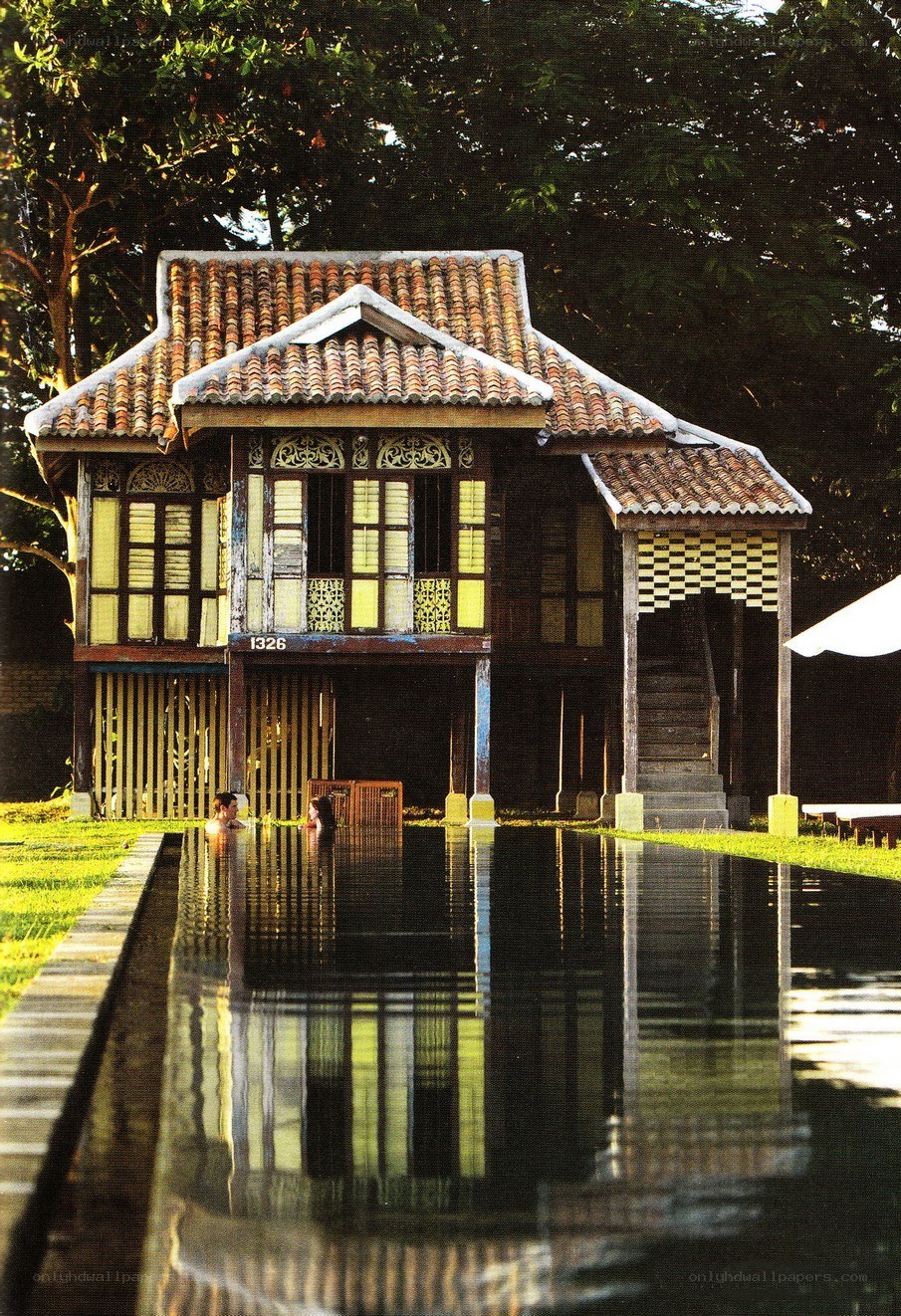 Traditional house by a pool