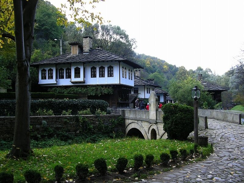 Traditional house by a stone bridge