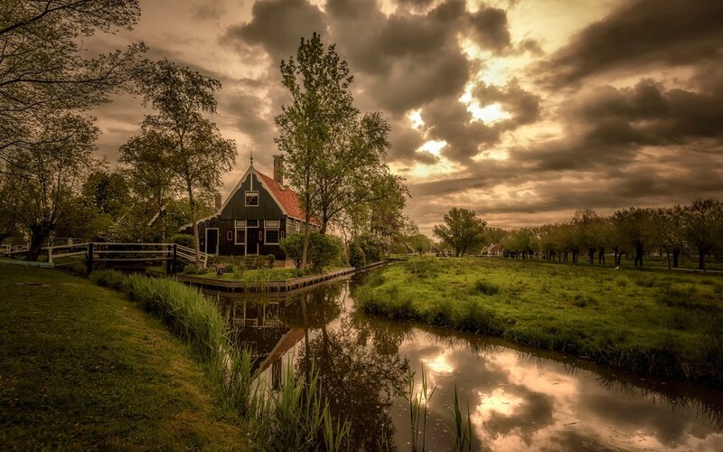 Traditional House by Canal