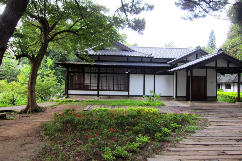 Traditional House in Garden — Green, Serene, Afternoon