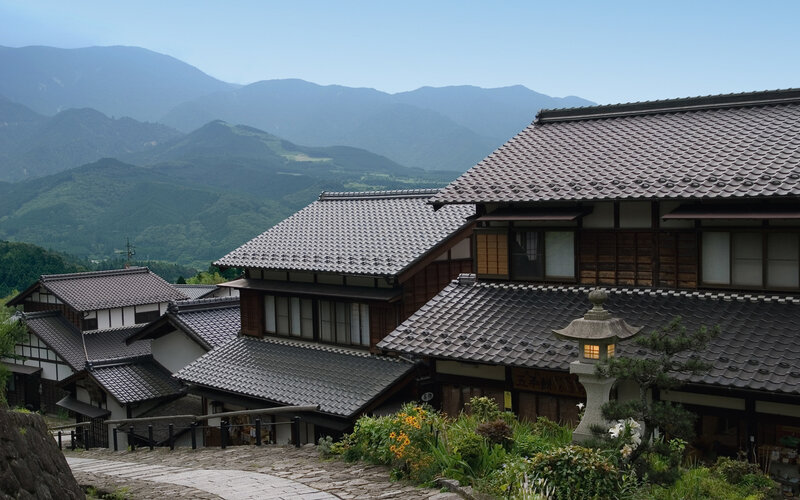 Traditional Japanese houses with mountain view