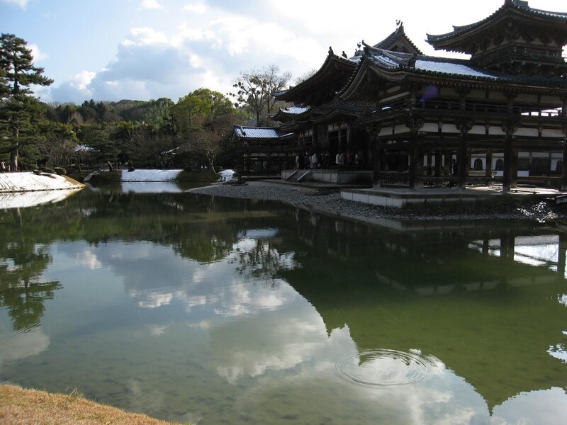 traditional japanese temple by pond