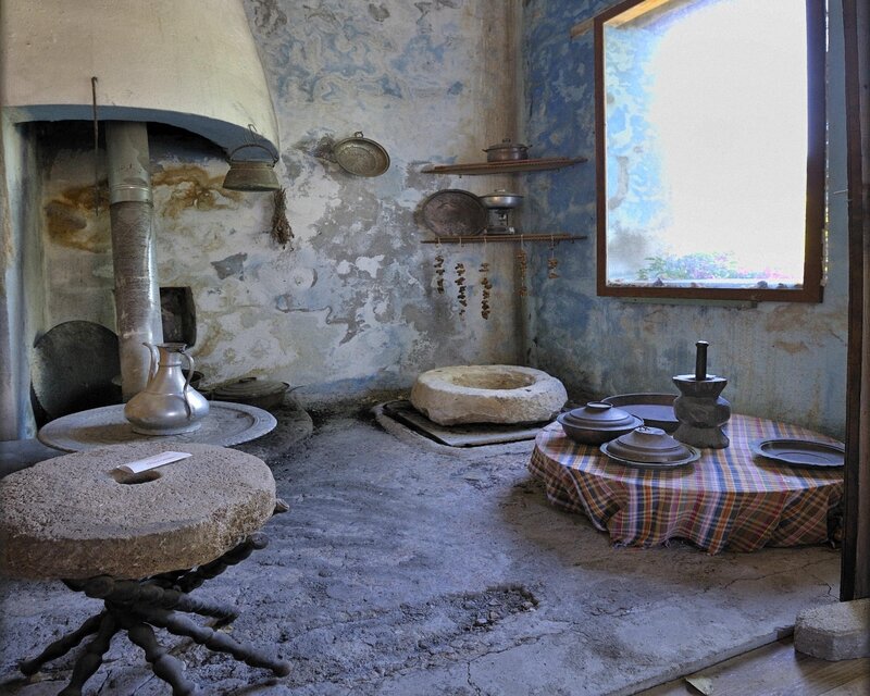 Traditional kitchen with stone mill