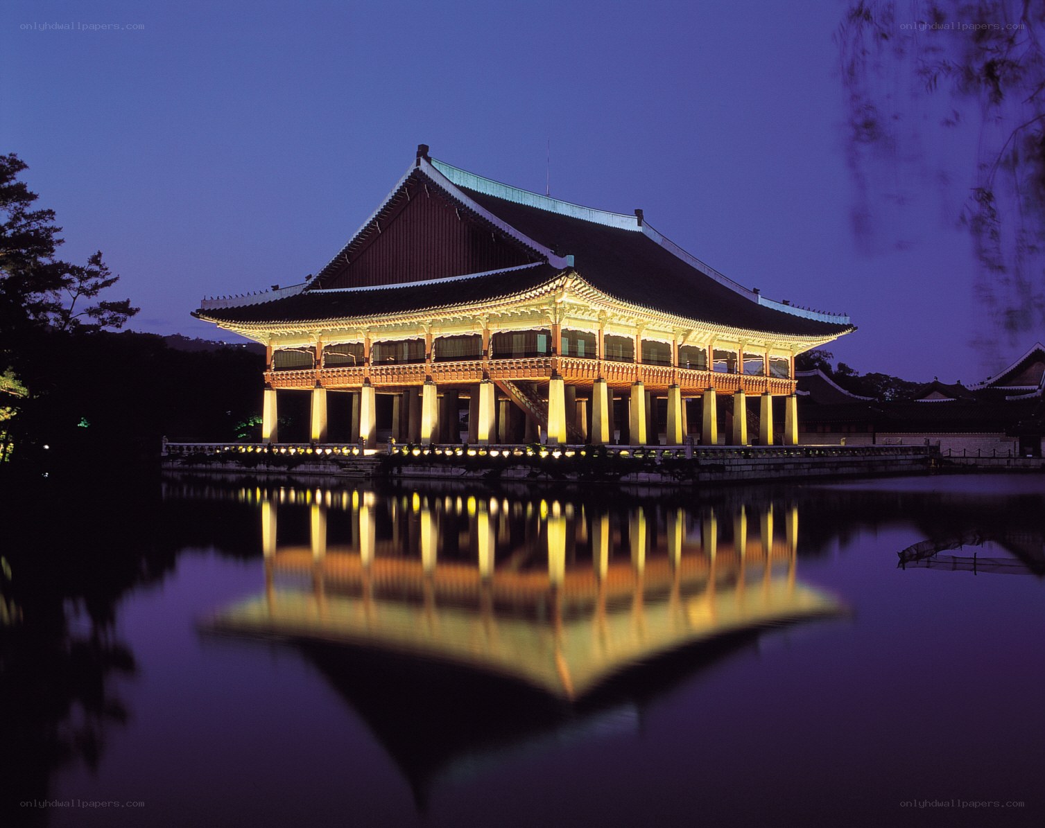 Traditional Korean pavilion at night