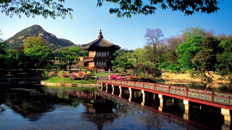Traditional Korean pavilion by a lake